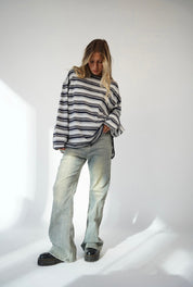 חולצת פסים עם כפתור בשרוול ניקה