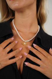 שרשרת פנינים עם פרח יאנה